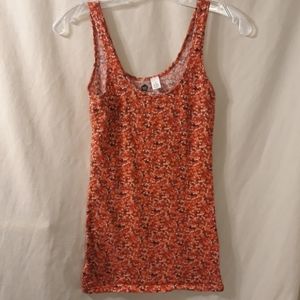 B P tank with red and orange floral pattern